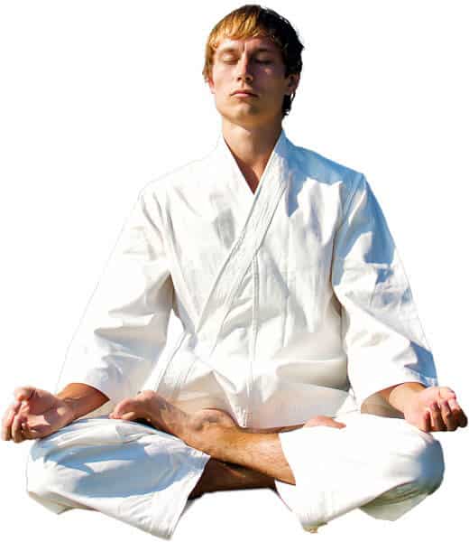Martial Arts Lessons for Adults in Aurora IL - Young Man Thinking and Meditating in White
