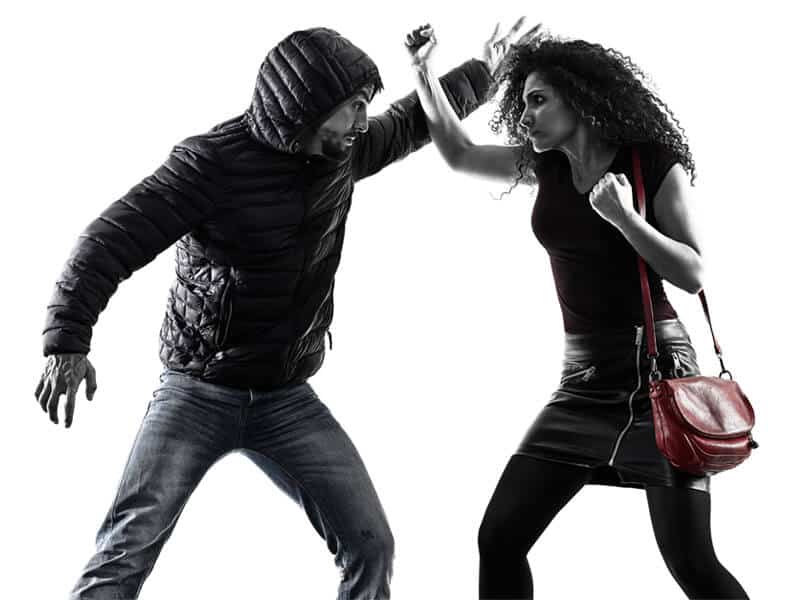 Self-Defense Program for Adults in Aurora IL - Blocking Punch Woman